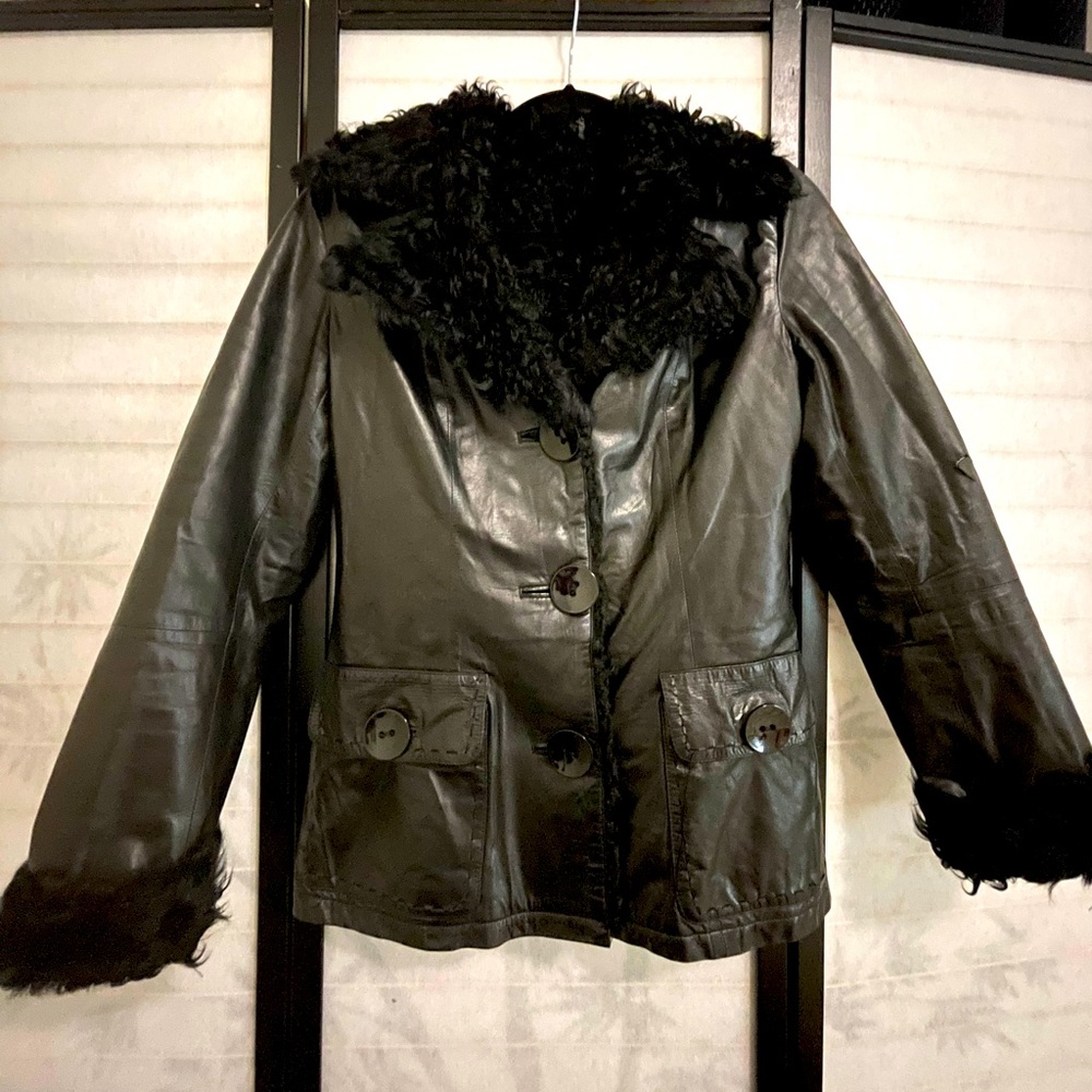 Genuine leather in real fur inside.